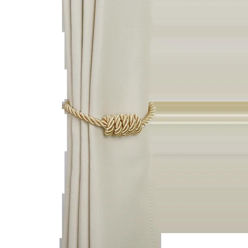 "bracelet torsadé ornemental en or" (twisted rope decorative bracelet in gold) would be a suitable keyword for this image. it highlights the unique twist design and the fact that it's made of gold, while also implying that it's a decorative piece.