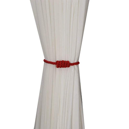 "bracelet tressé rouge original et robuste" (which means "unique twisted red rope bracelet and sturdy") could be a good short and simple keyword for this image. it highlights both the unconventional appearance and the red color of the bracelet, while also emphasizing its robustness thanks to the twisted rope design.