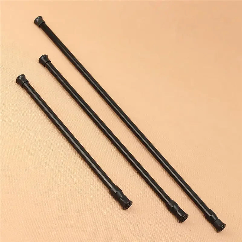 Tringle à rideau extensible noire sans perçage, à ressort réglable — 55 à 90 cm