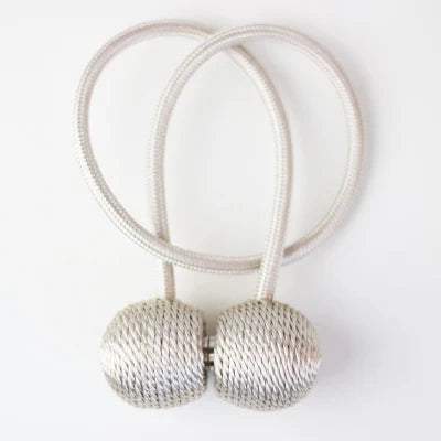 Fascetta magnetica per tende